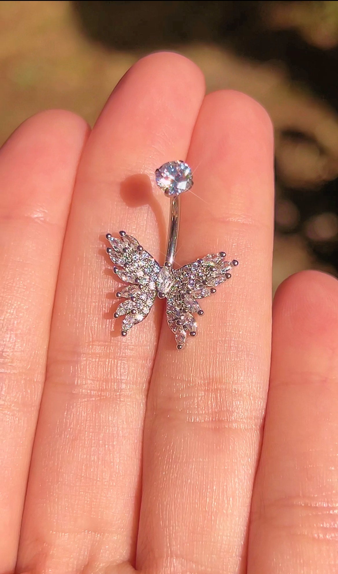 Non-dangle butterfly titanium belly ring, detail view