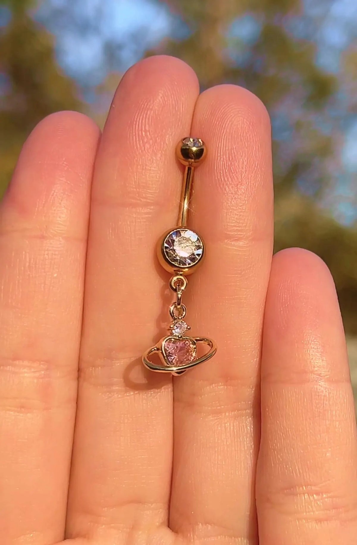 Gold heart planet charm belly ring