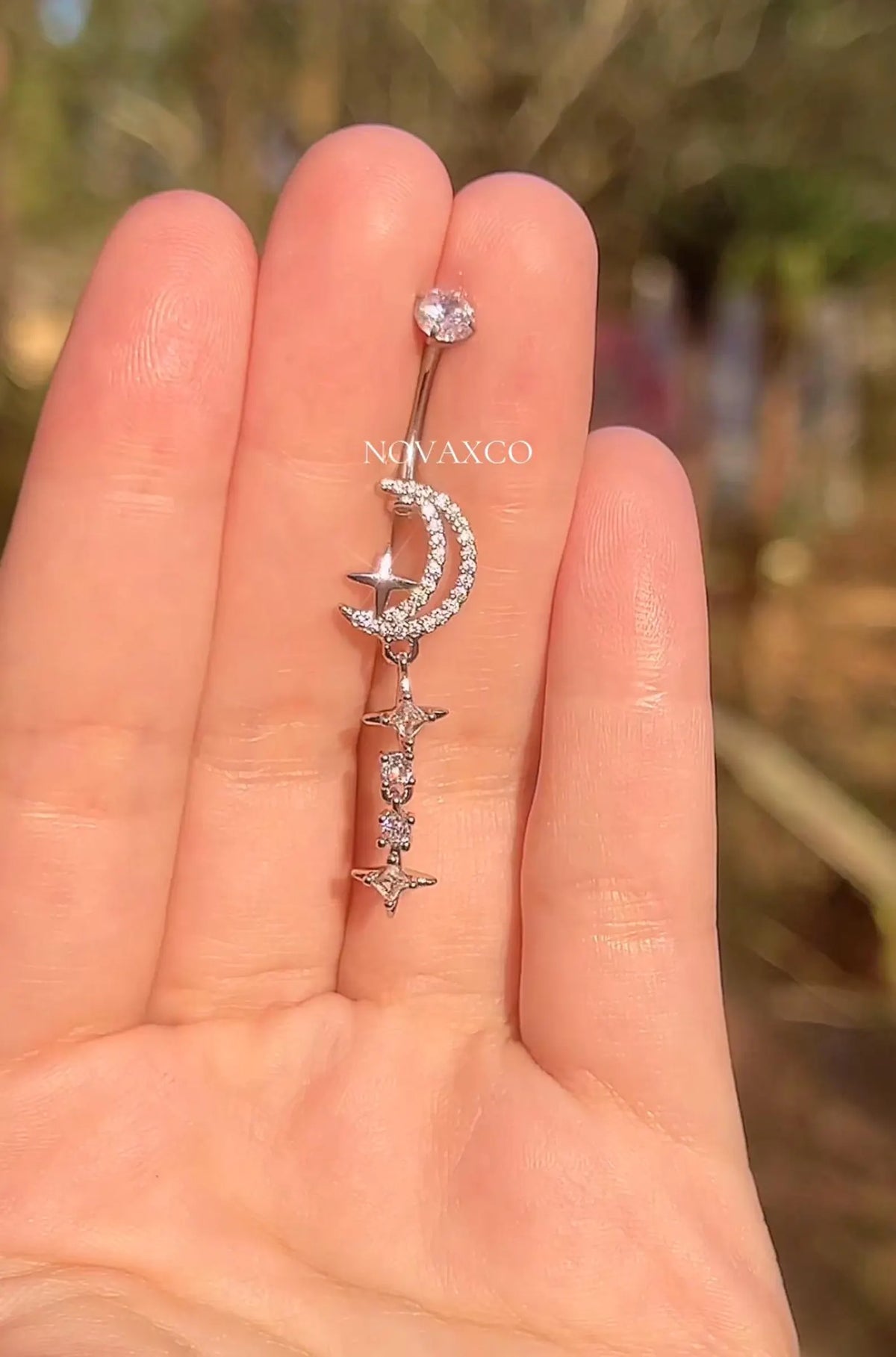 Titanium star and moon belly ring, another view