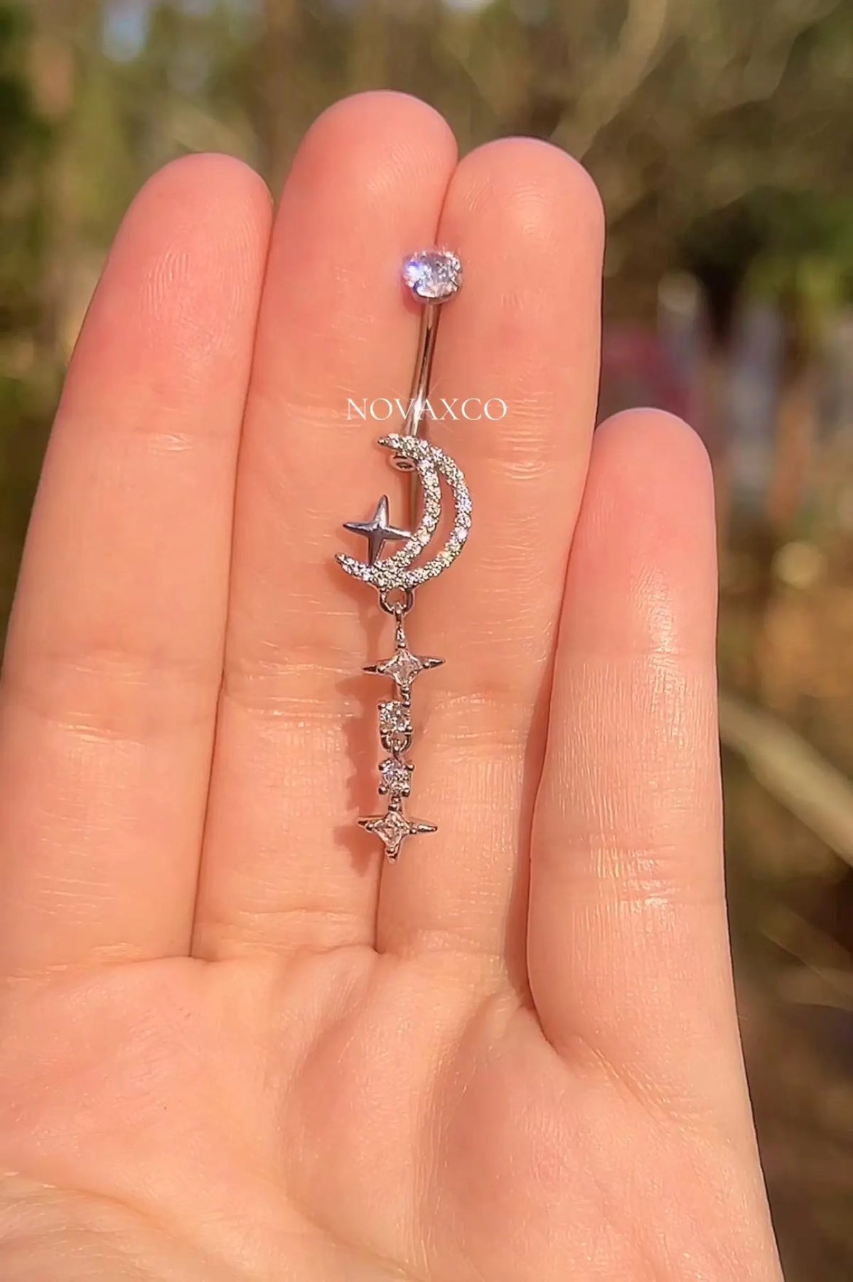 Titanium star and moon belly ring