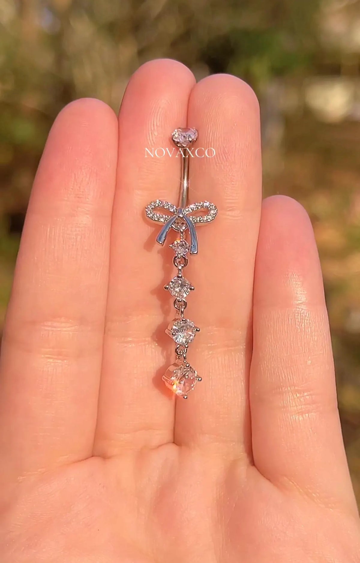 Long bow dangle titanium belly ring