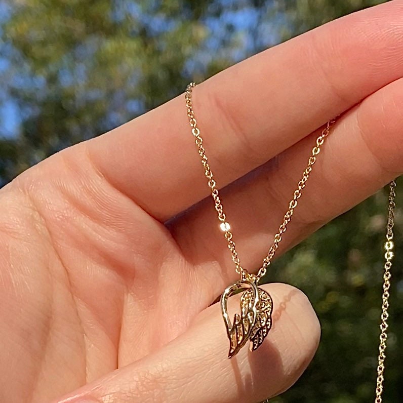 gold charm dream angel necklace