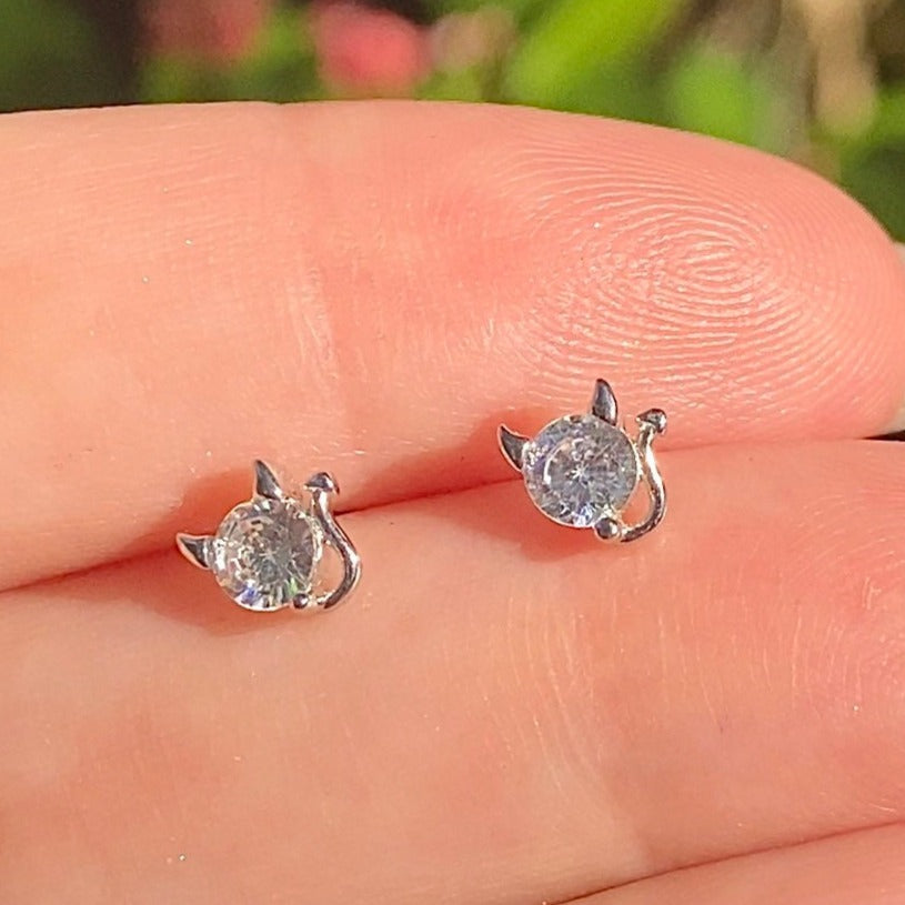 two devil stud earrings with cubic zirconia gemstone