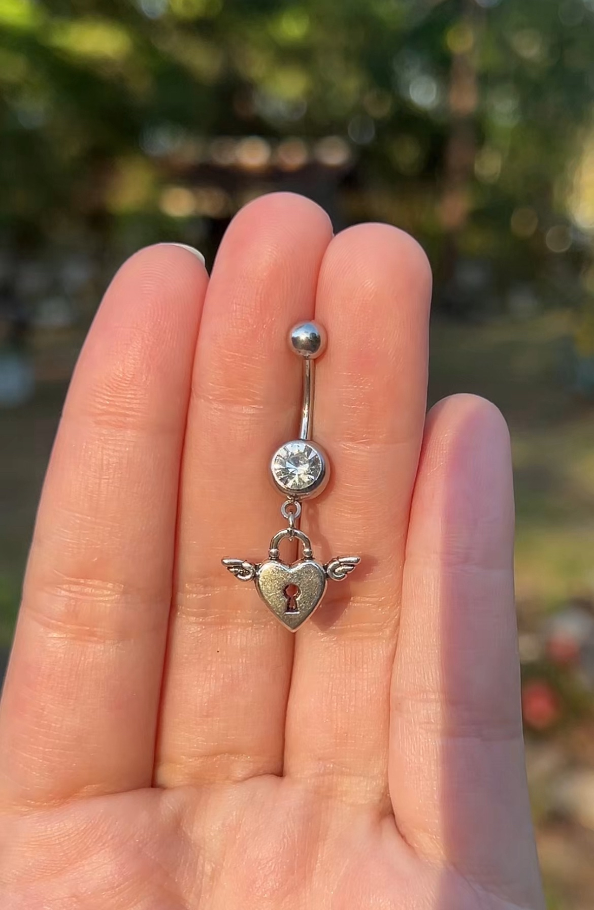 Belly button ring with angel wing lock heart design 