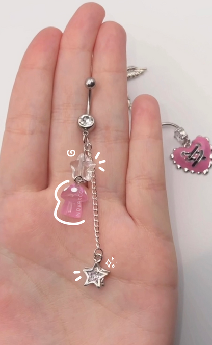 Star dangle belly ring with a pink glow in the dark mushroom charm 14g 10mm