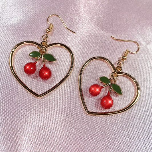 Golden heart hoop earrings with sparkling cherry in centre