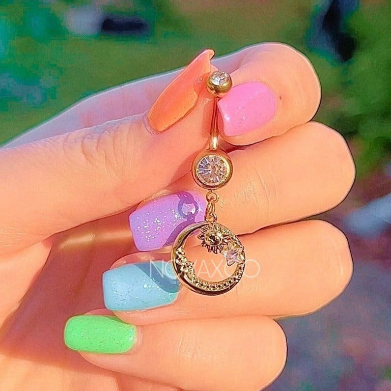 gold belly ring with moon face, sun and star