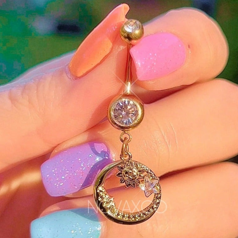 gold belly ring with moon face, sun and star