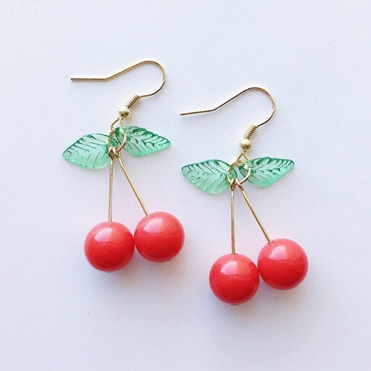 gold cherry earrings with green leaves two cherries