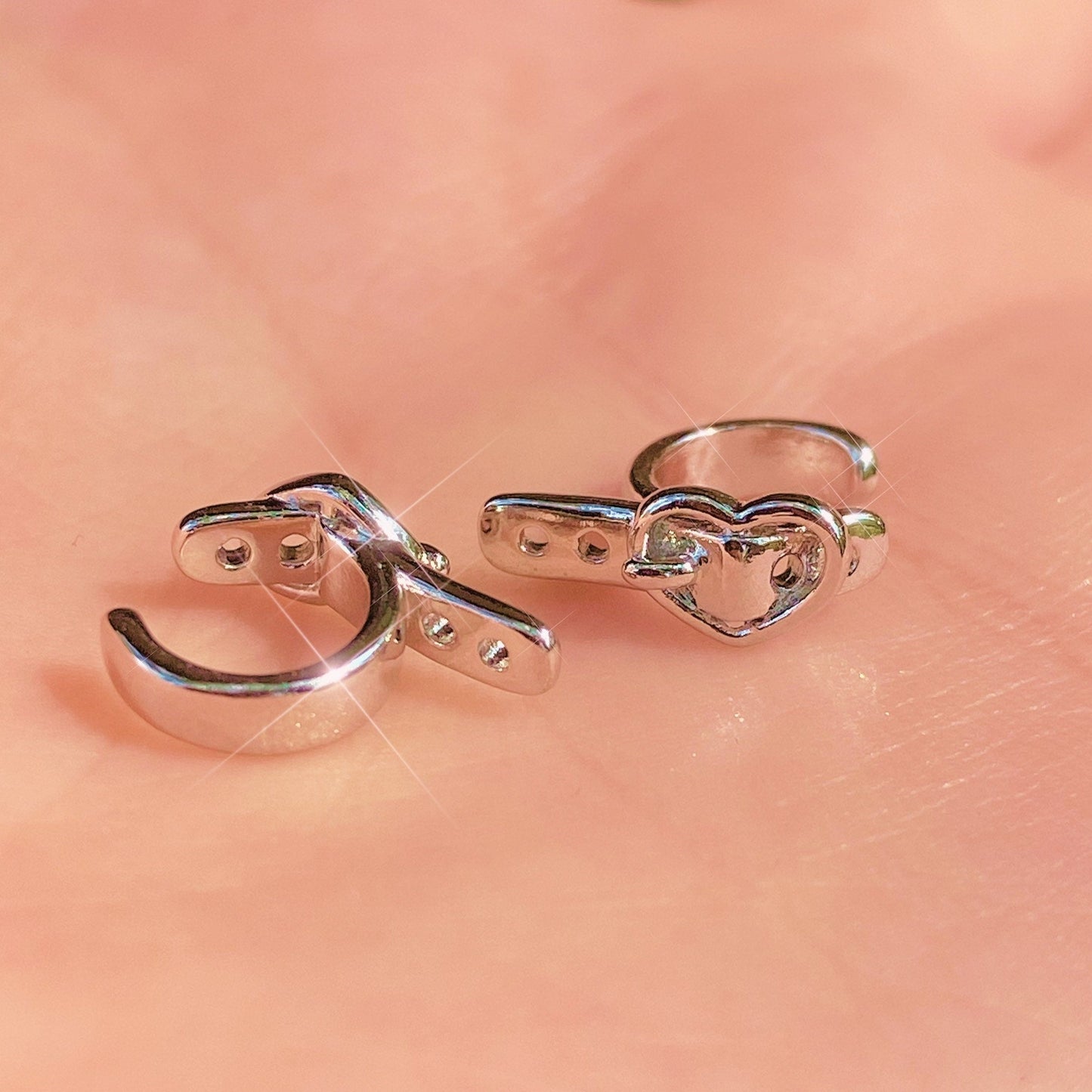 set of two heart buckle ear cuffs