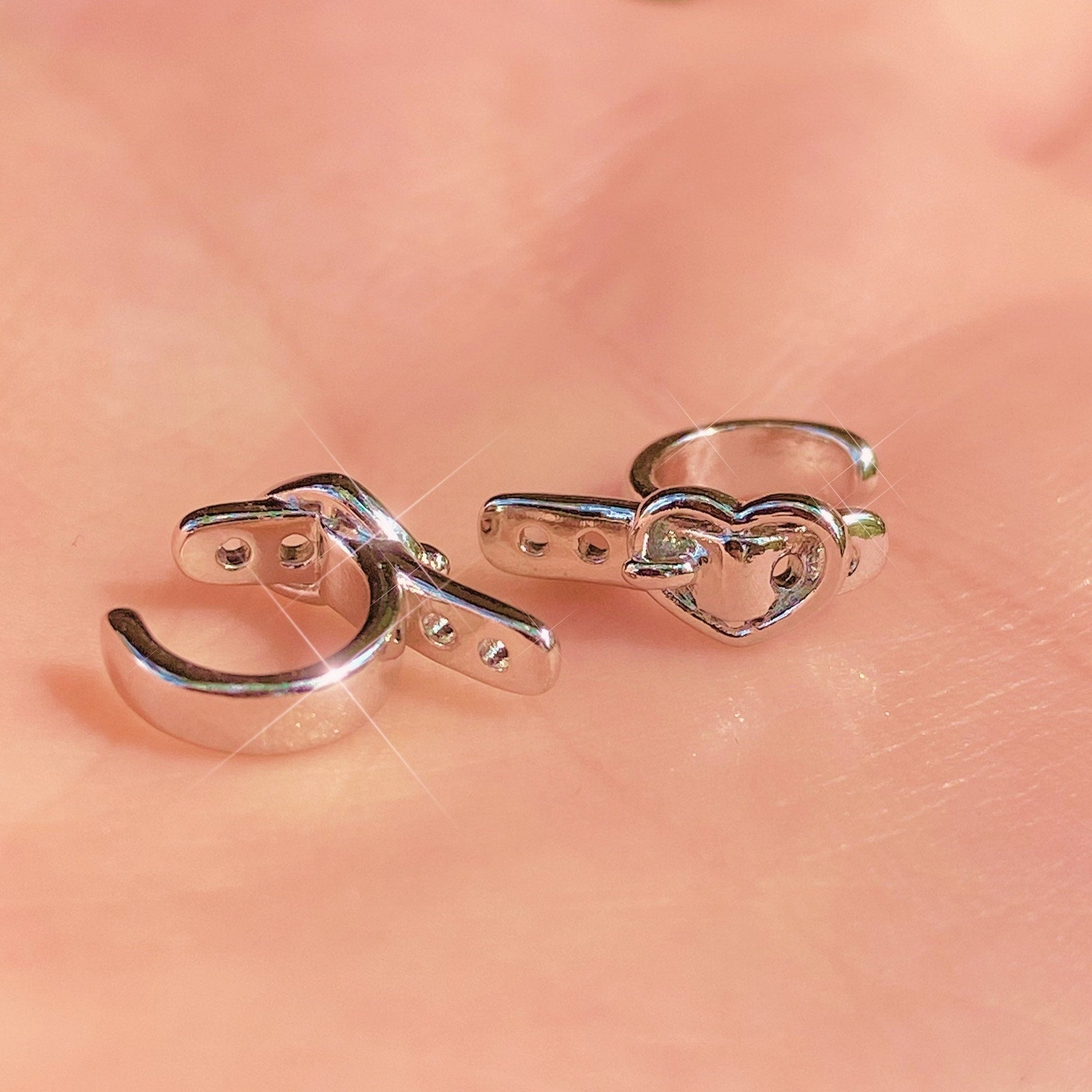 set of two heart buckle ear cuffs