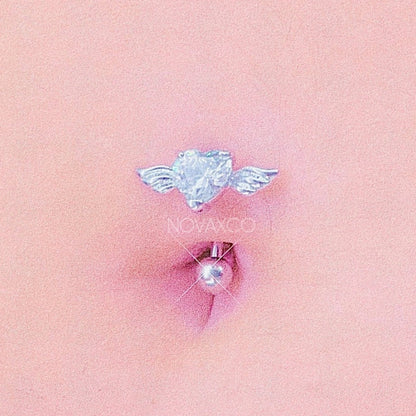 closeup of belly with upside down heart belly ring with clear stone